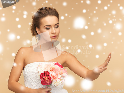 Image of bride with wedding ring