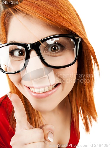 Image of woman in glasses with finger up
