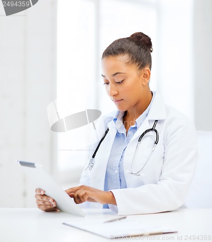 Image of african female doctor with tablet pc