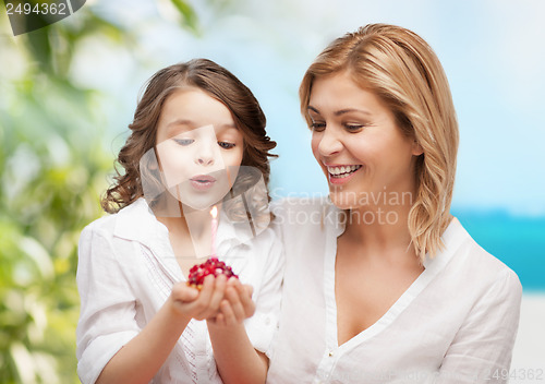 Image of happy mother and daughter