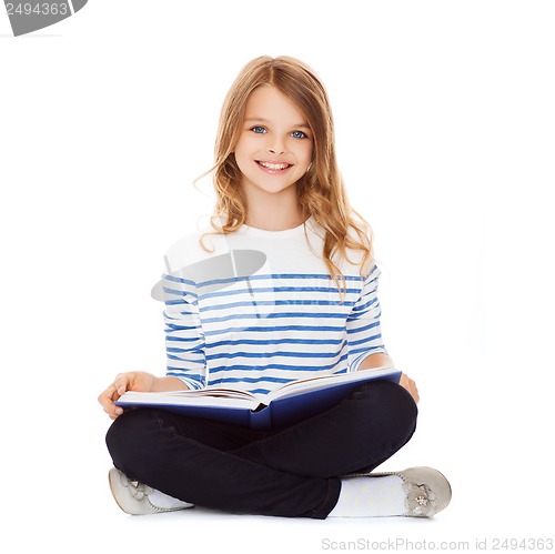 Image of student girl studying and reading book
