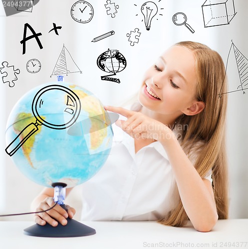 Image of student girl with globe at school