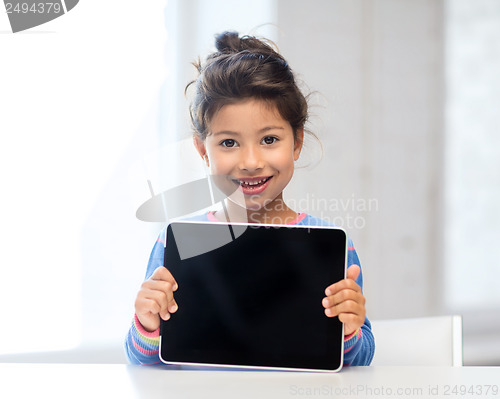 Image of girl with tablet pc at home