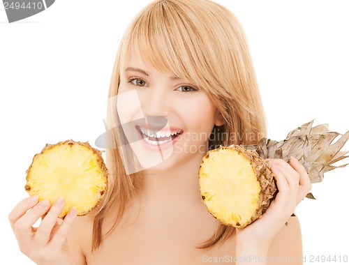 Image of happy girl with pineapple