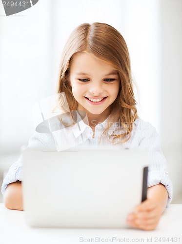 Image of girl with tablet pc at school