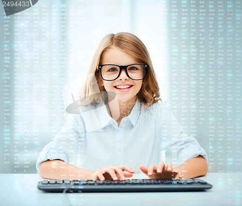 Image of student girl with keyboard