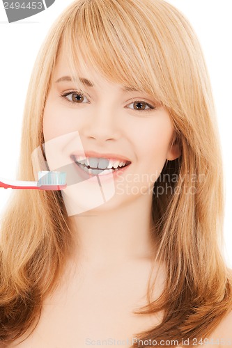 Image of teenage girl with toothbrush