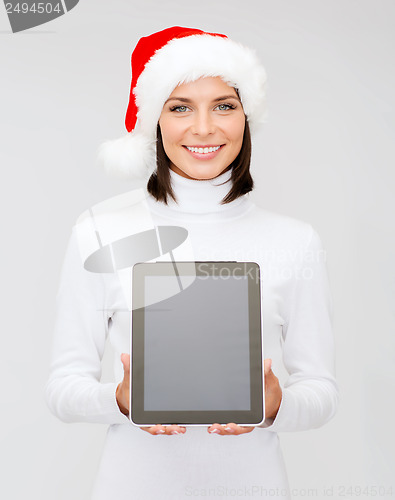 Image of woman in santa helper hat with tablet pc