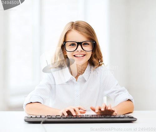 Image of student girl with keyboard
