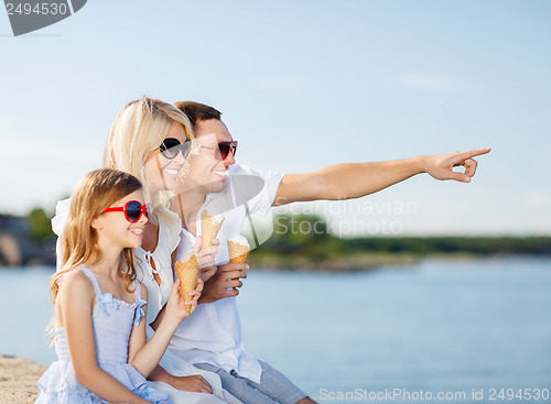 Image of happy family eating ice cream