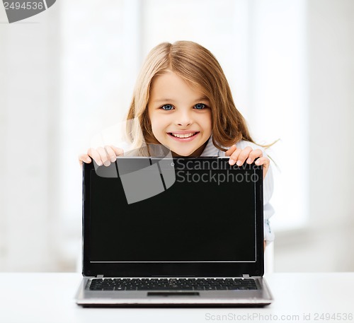 Image of girl with laptop pc at school