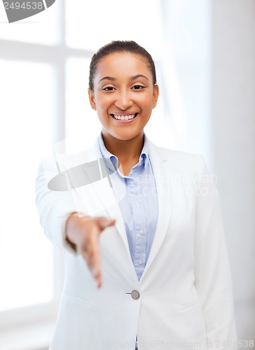 Image of businesswoman ready for handshake