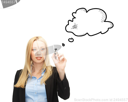 Image of businesswoman drawing blank text bubble