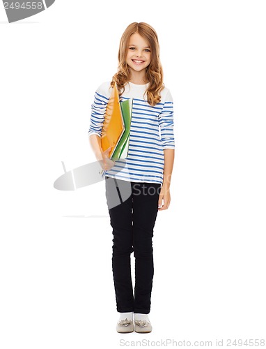 Image of child holding colorful folders