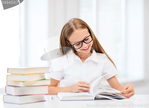 Image of student girl studying at school