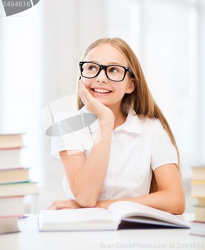 Image of student girl studying at school