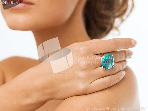Image of beautiful woman with cocktail ring