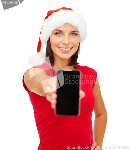 Image of woman in santa helper hat with smartphone