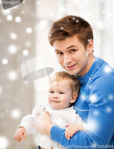 Image of happy father with adorable baby