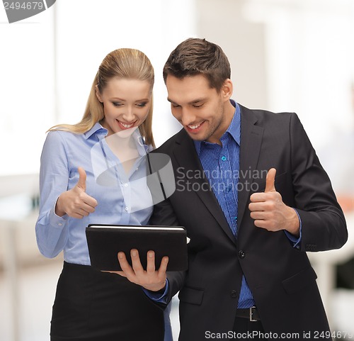 Image of man and woman with tablet pc