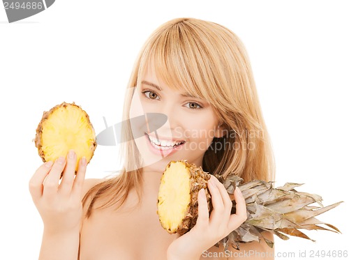 Image of happy girl with pineapple