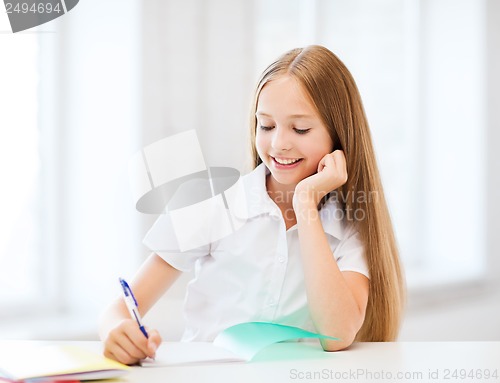Image of student girl studying at school