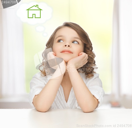 Image of girl dreaming about the house