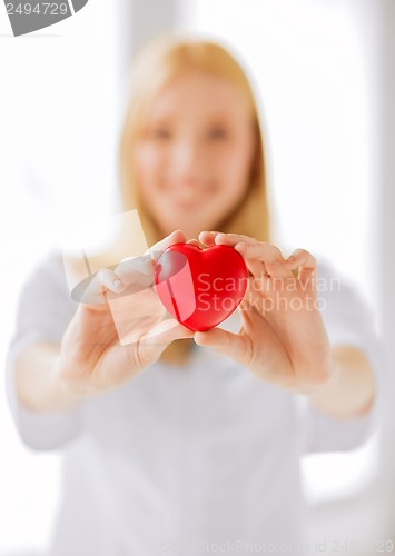 Image of female doctor with heart