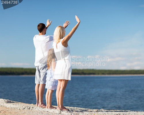 Image of happy family at the seaside