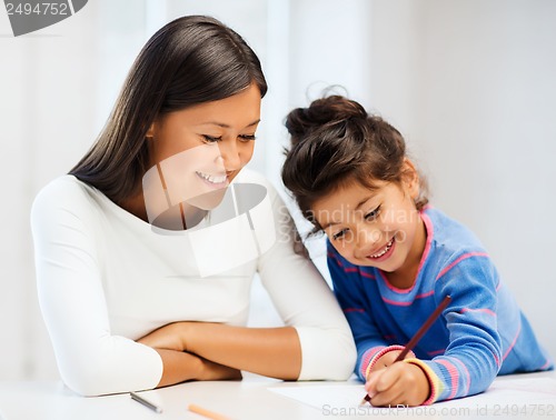 Image of mother and daughter drawing