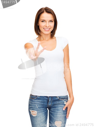 Image of woman showing victory or peace sign