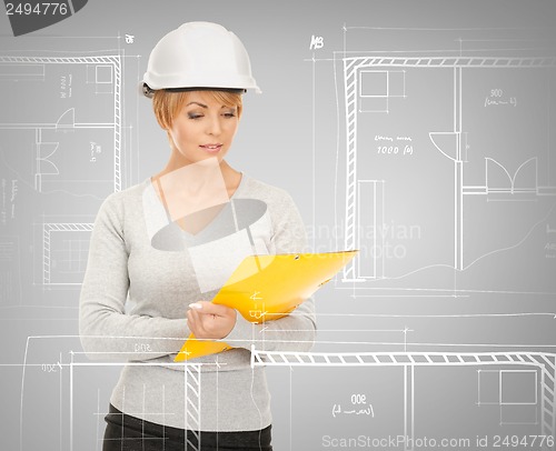 Image of female contractor in helmet