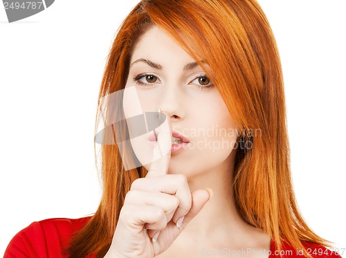 Image of woman with finger on her lips