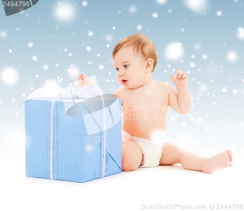 Image of happy child with gift box