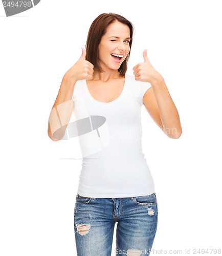 Image of woman showing thumbs up and winking