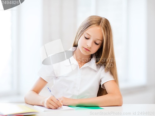 Image of student girl studying at school