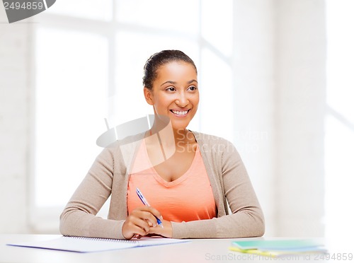 Image of international student studying in college
