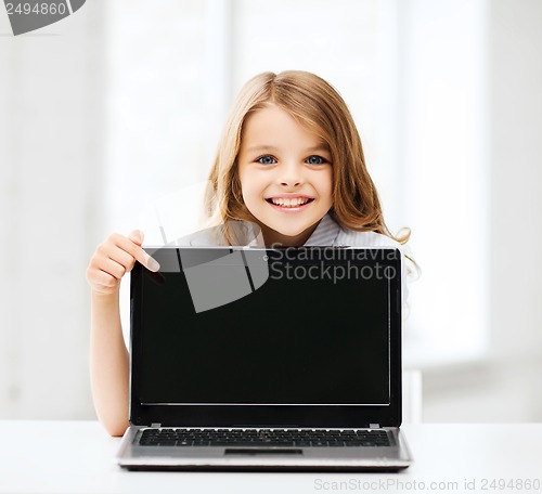 Image of girl with laptop pc at school