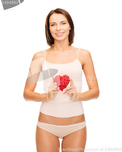 Image of beautiful woman in cotton underwear and red heart