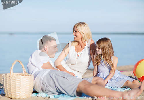 Image of happy family having a picnic
