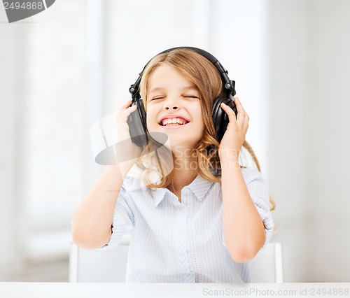 Image of girl with headphones listening to music