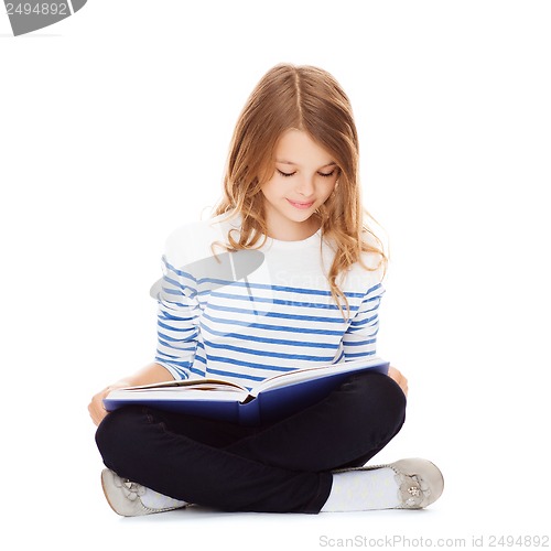 Image of student girl studying and reading book