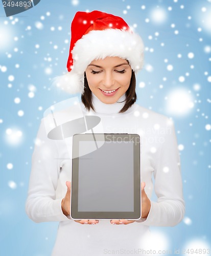 Image of woman in santa helper hat with tablet pc