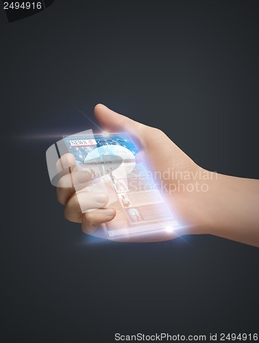 Image of hand and smartphone with news