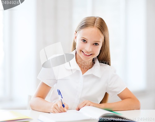 Image of student girl studying at school