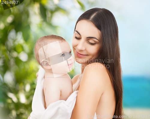 Image of happy mother with adorable baby