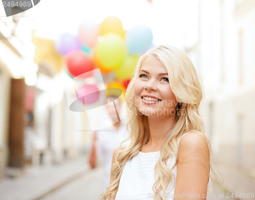 Image of couple with colorful balloons