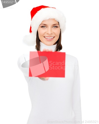 Image of woman in santa helper hat with blank red card