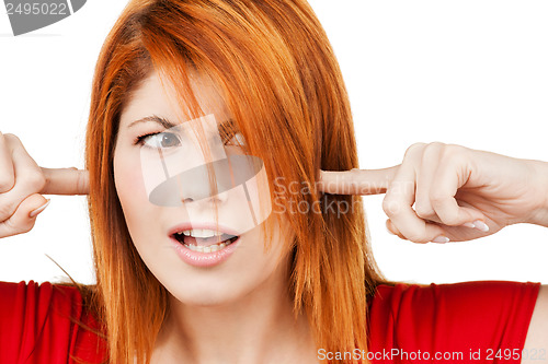 Image of woman with fingers in ears