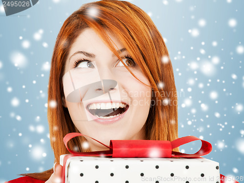 Image of happy woman with gift box